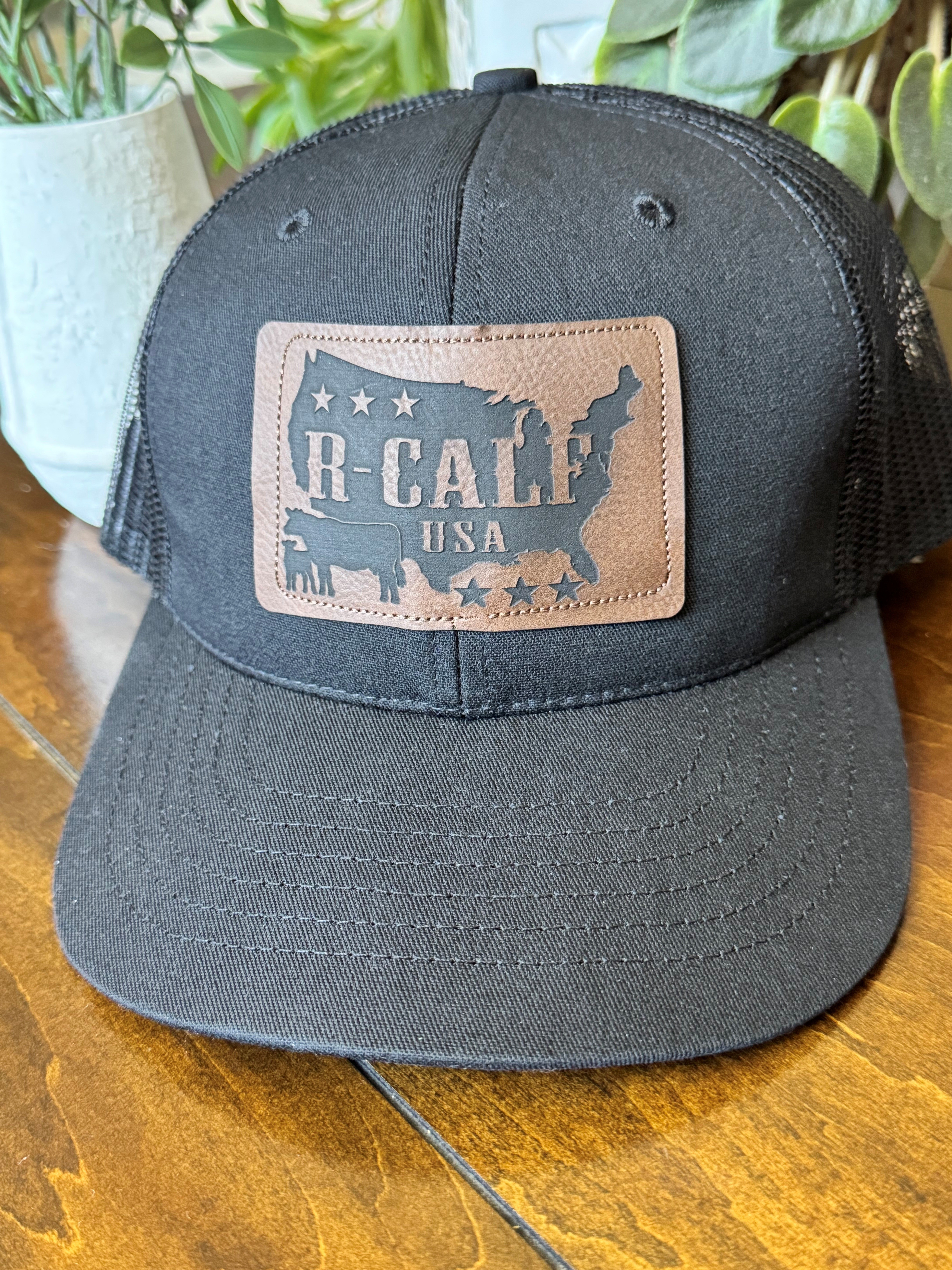 Black Trucker Hat with Leather Logo Patch